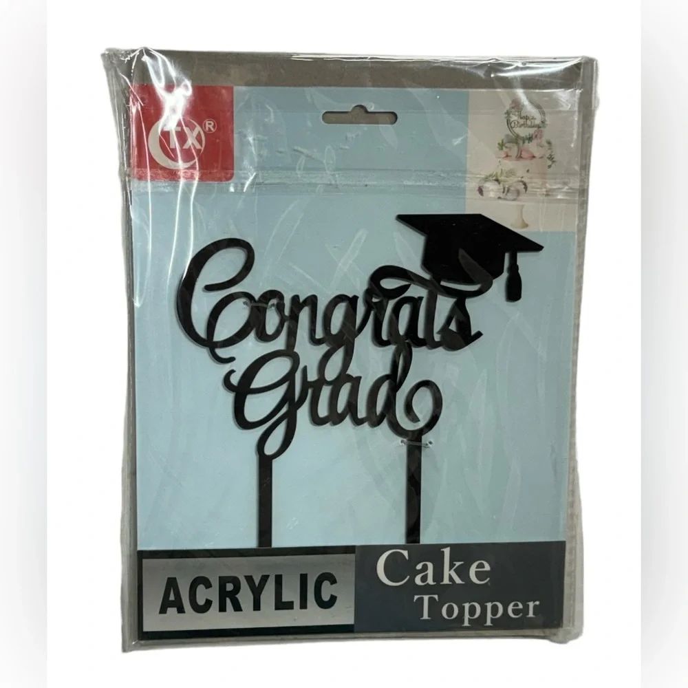Congrats Grad acrylic cake topper brand new in packaging. Never opened or used!
